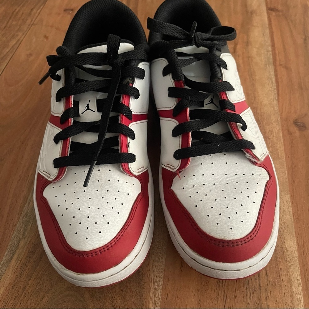 Nike Air Jordan Nu Retro 1 Low "Chicago"  in a varsity red, white, and black